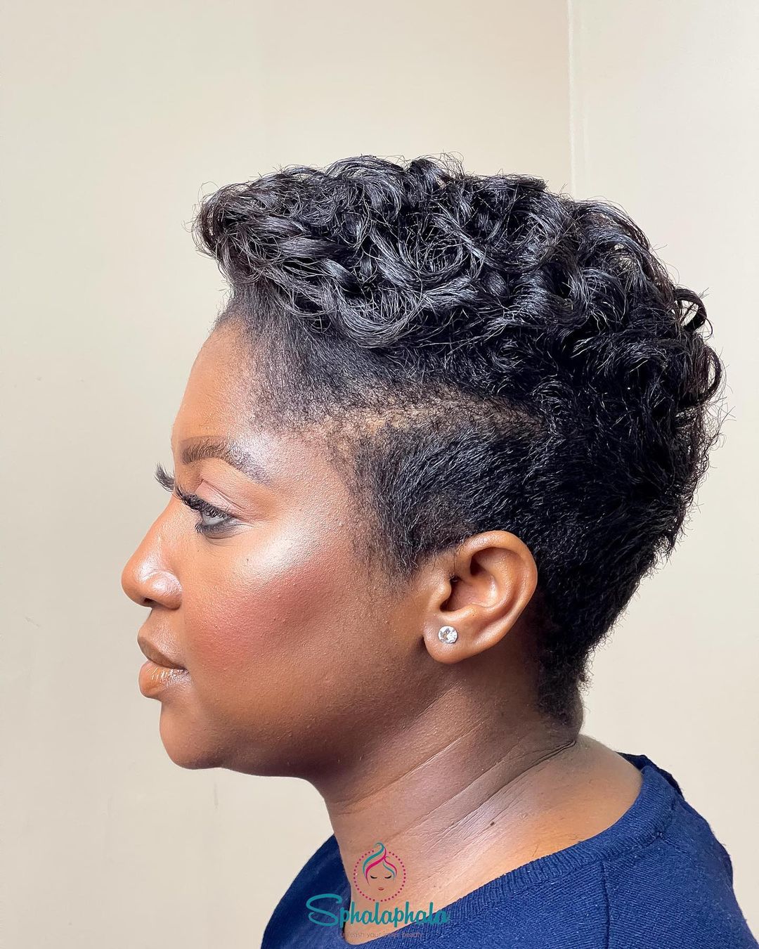 curly pixie cut with tapered sides