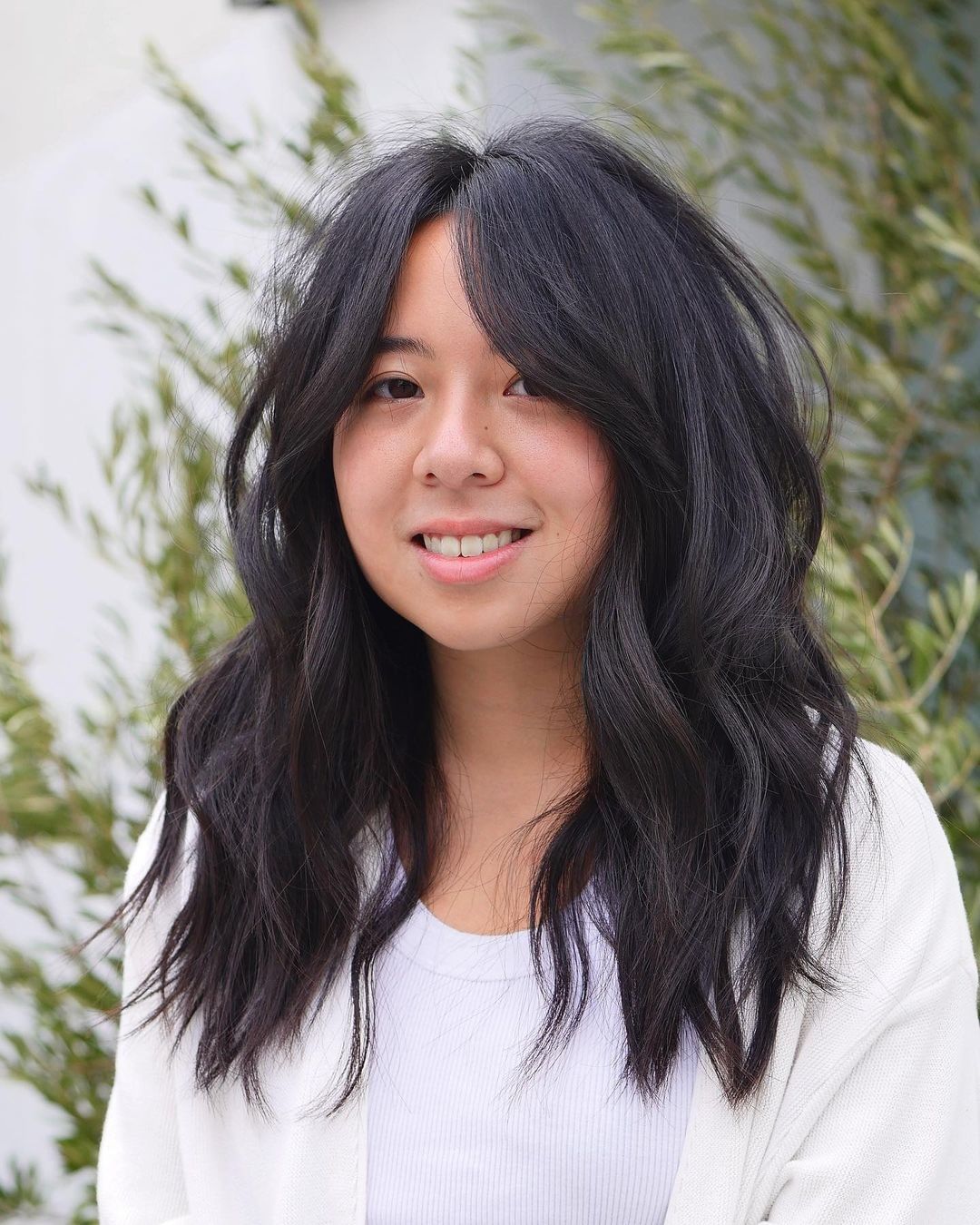 curtain bangs and long layers on black hair