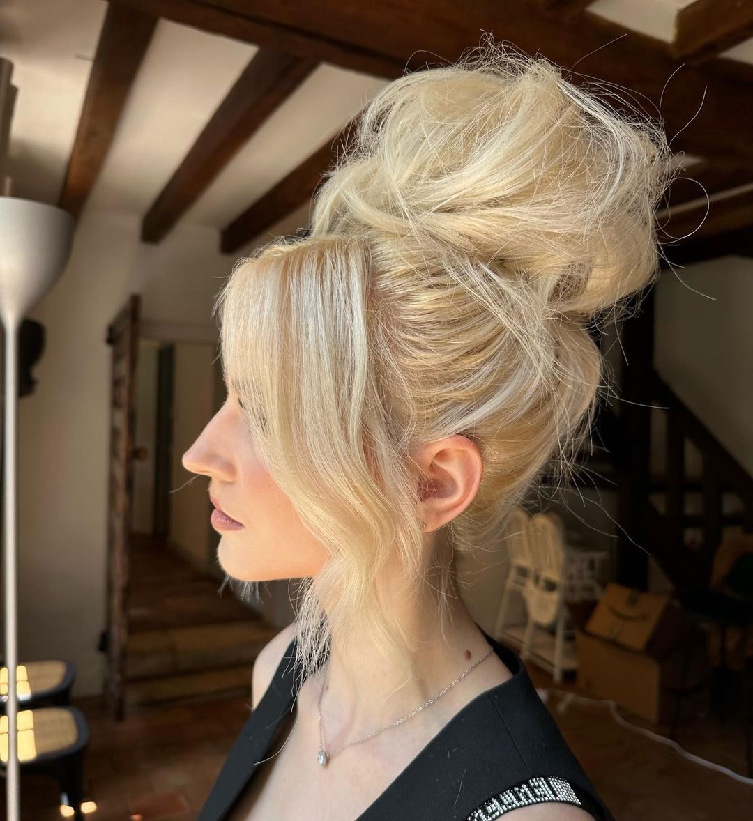 high bun on long blonde hair