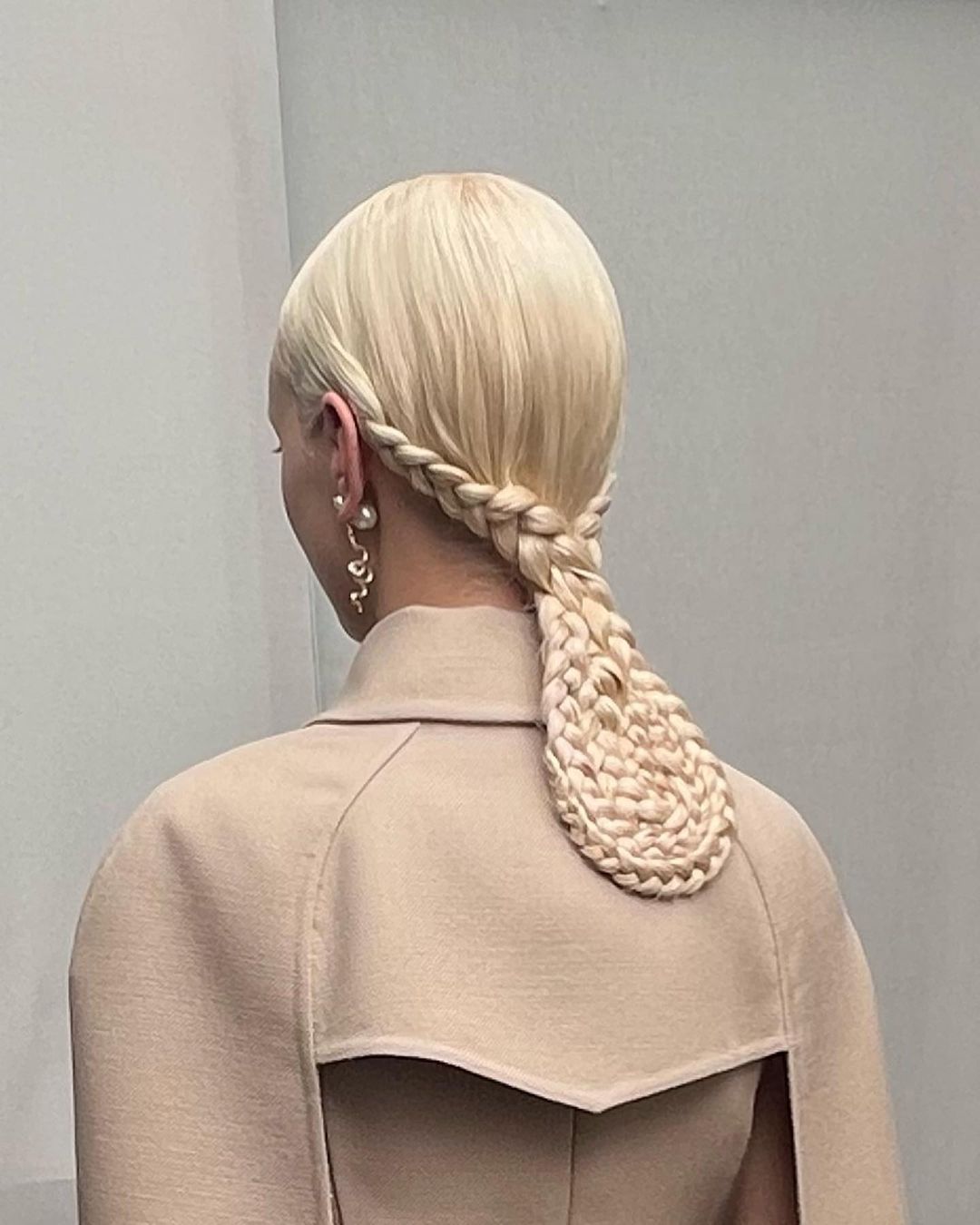 infinite braid in a low ponytail