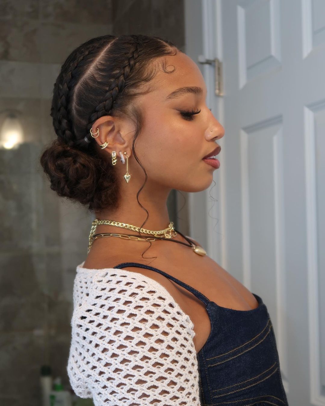 low curly bun with cornrows