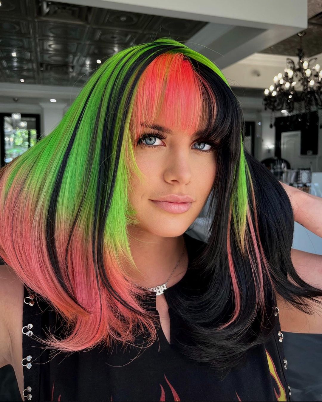 multicolored highlights on black hair with bangs