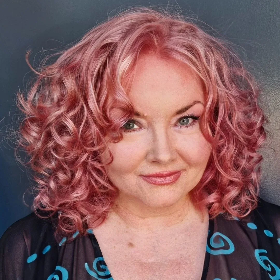 pastel pink short curly hairstyle