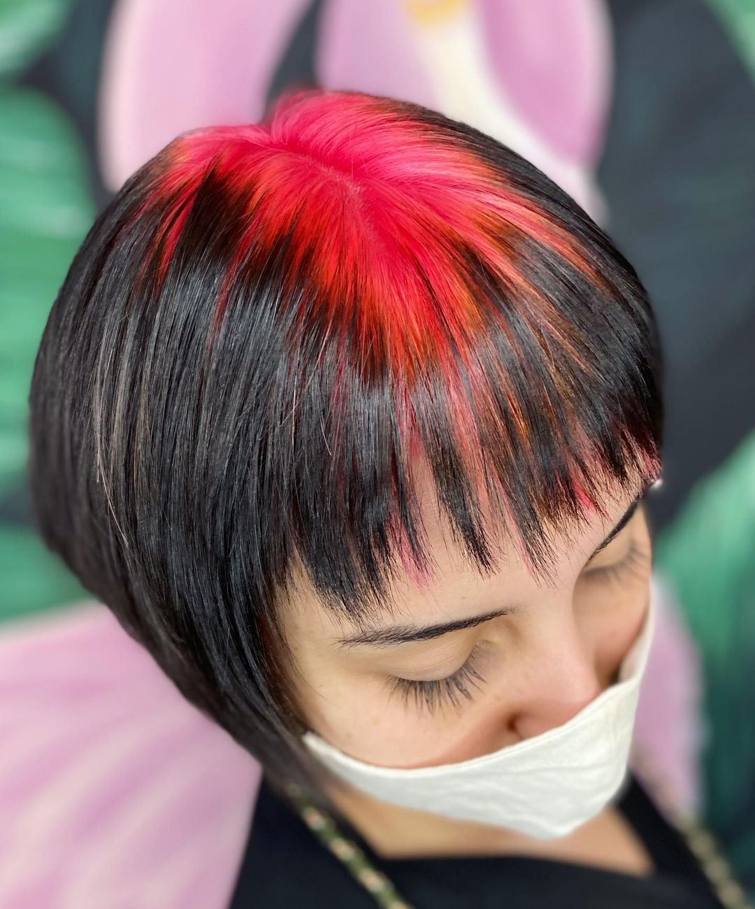 pink roots on black pixie cut