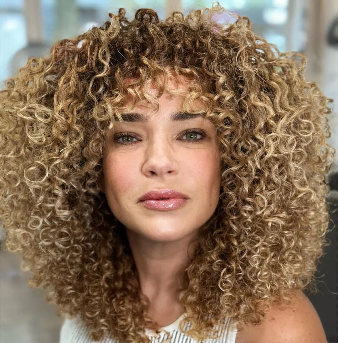 textured rezo cut curly hairstyle