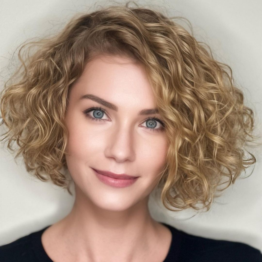 short curly bob with a deep side part