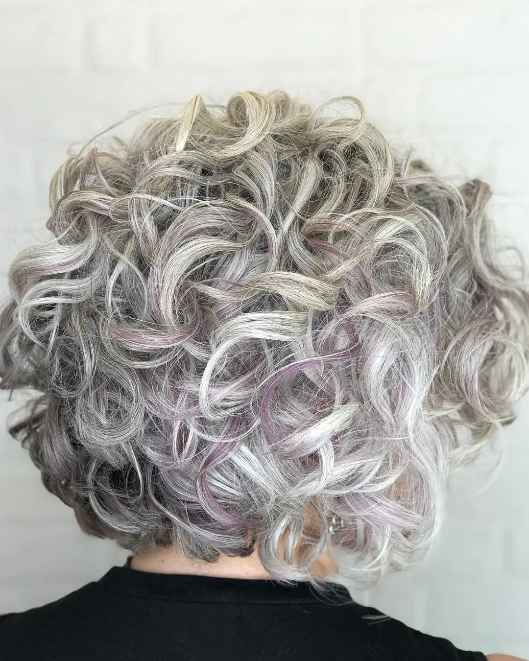 silver curls with pastel purple highlights