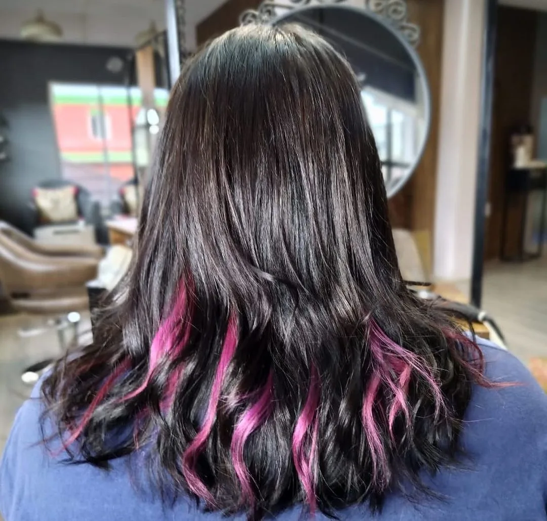 subtle pink ombre in black hair