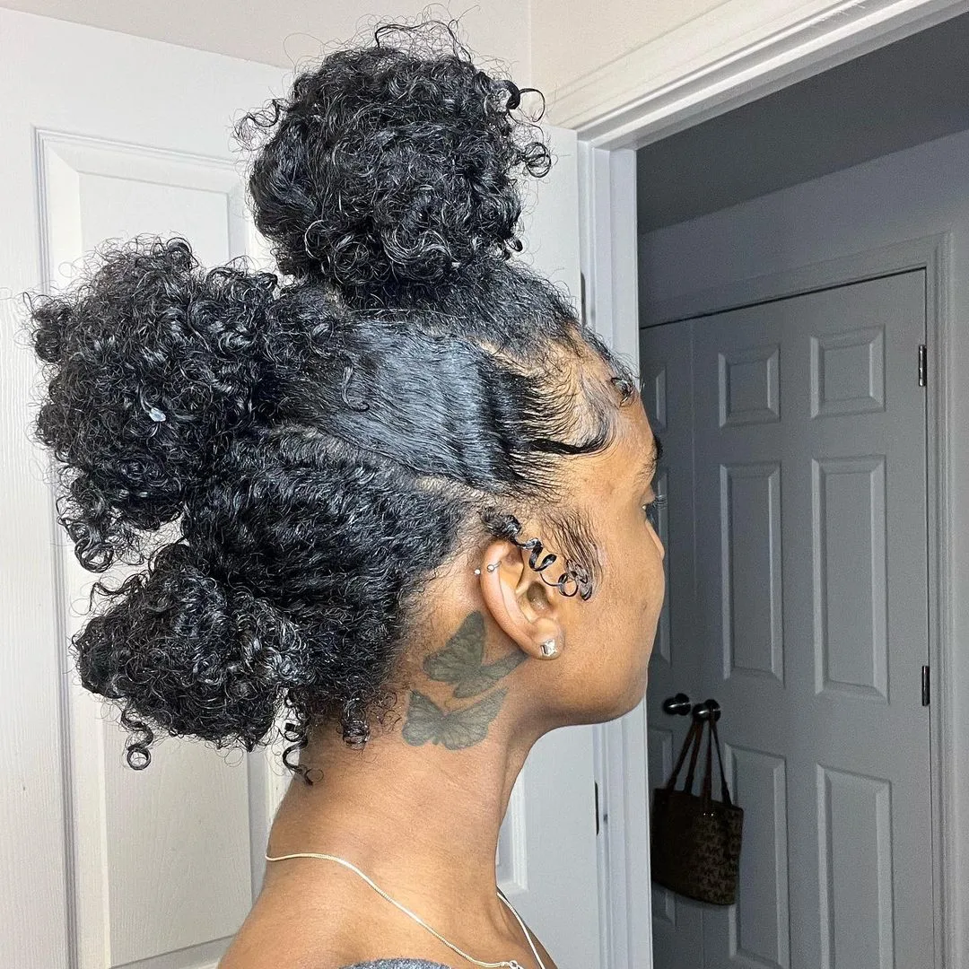 three buns on short curly hair
