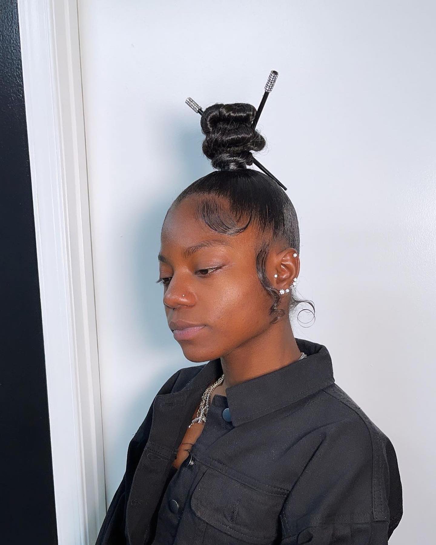 top knot with stick on black hair