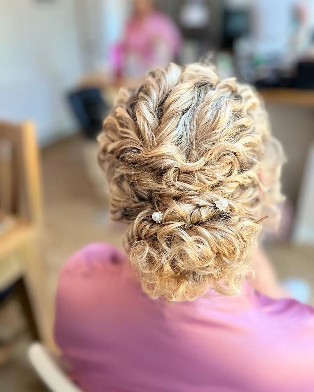 romantic updo for naturally curly hair