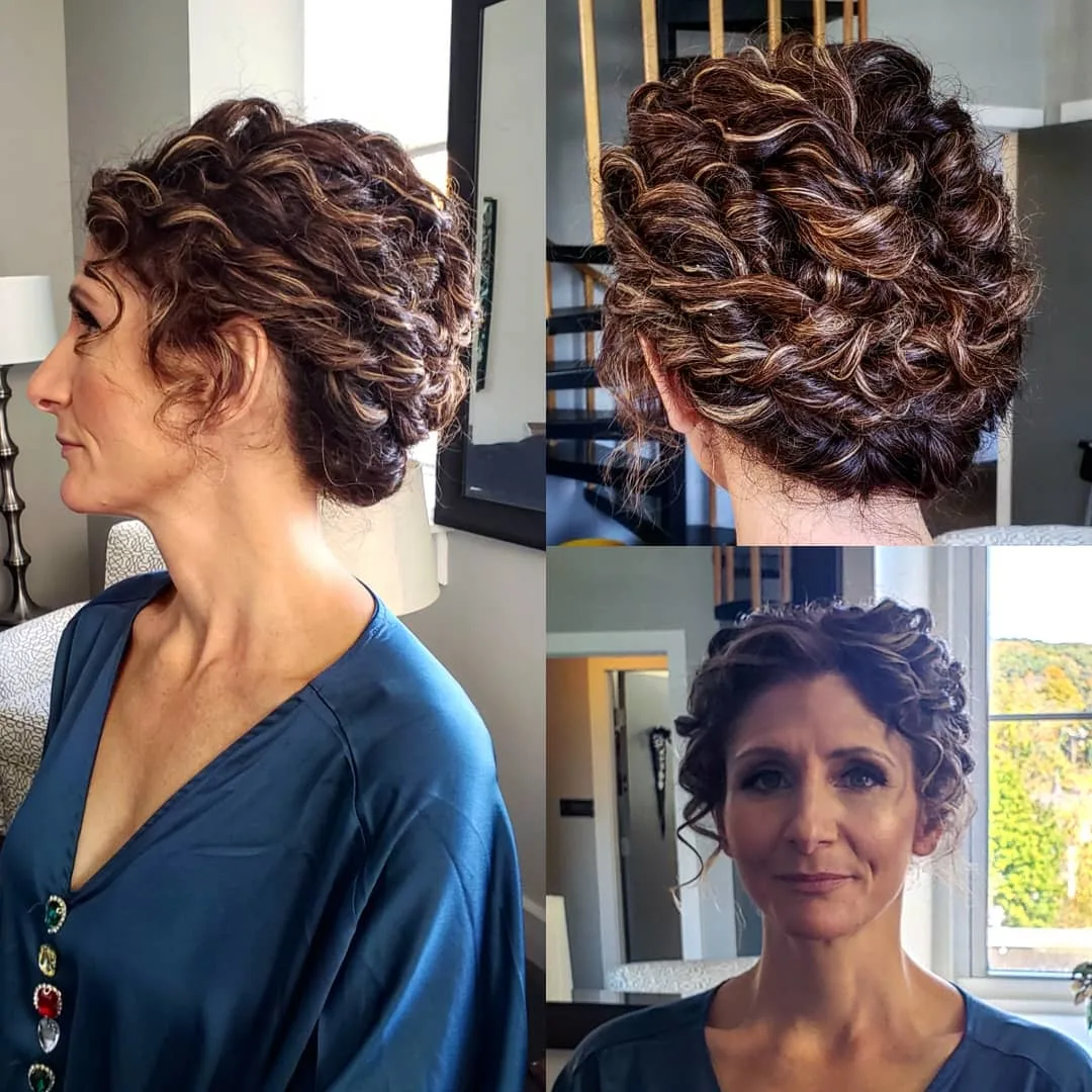 curly updo with waves and face framing bangs