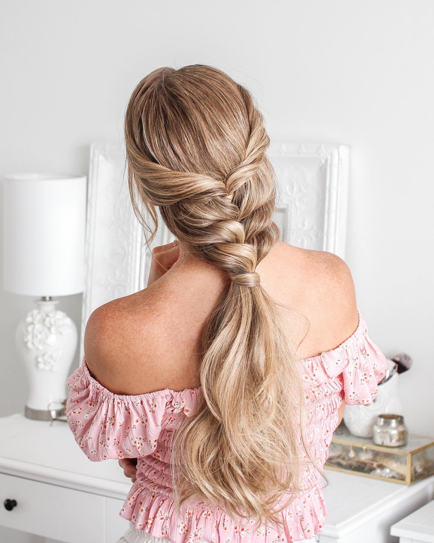 loose french braid into low ponytail