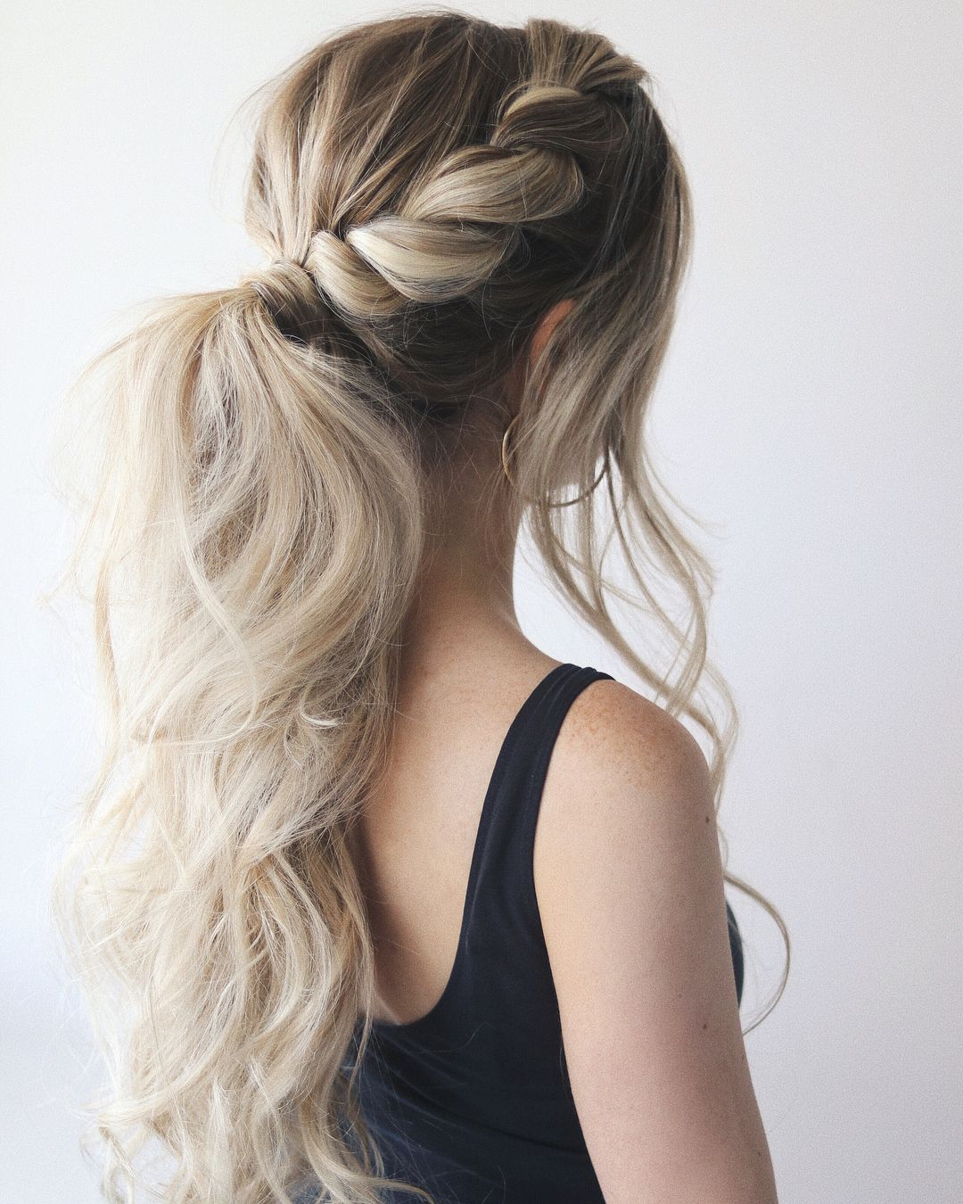 twist side braid into low ponytail