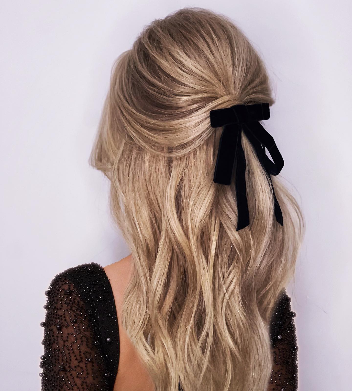 half up half down ponytail with ribbon