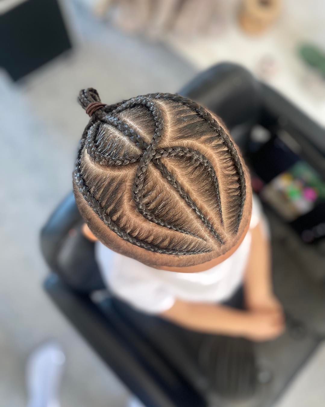 Cornrows With Top Knot And Fade 