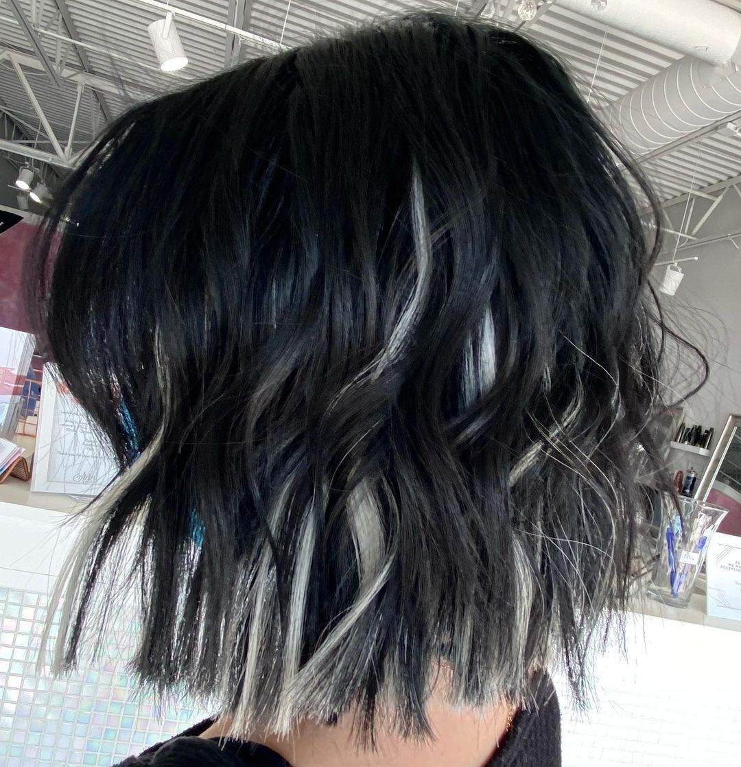 black curly bob with white babylights
