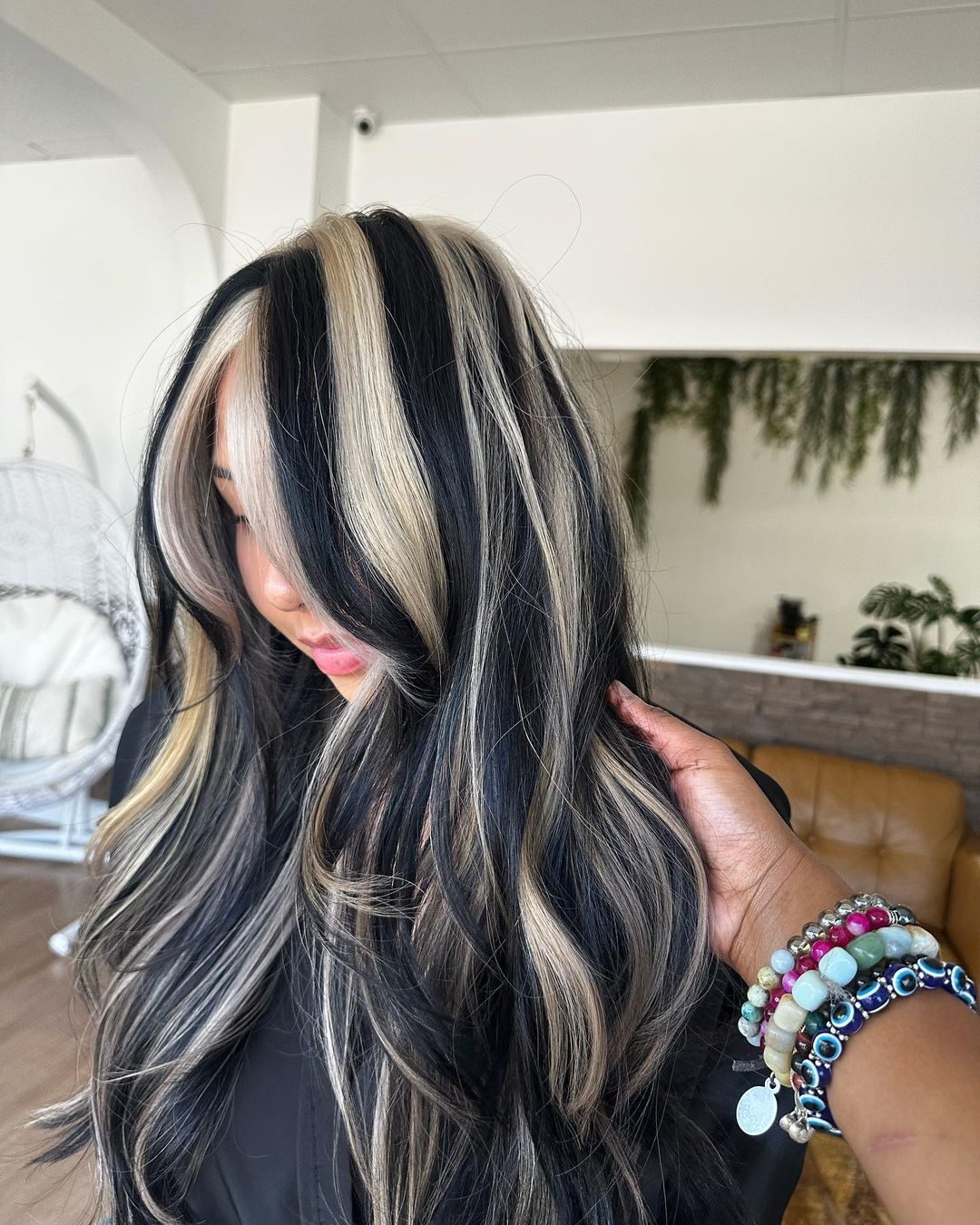 black hair with white chunky highlights