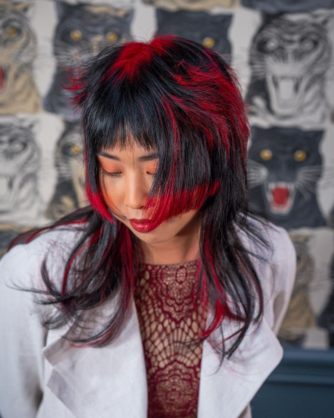 black hime cut with red roots