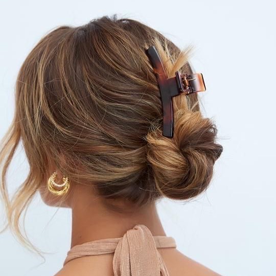 low bun with a clw clip