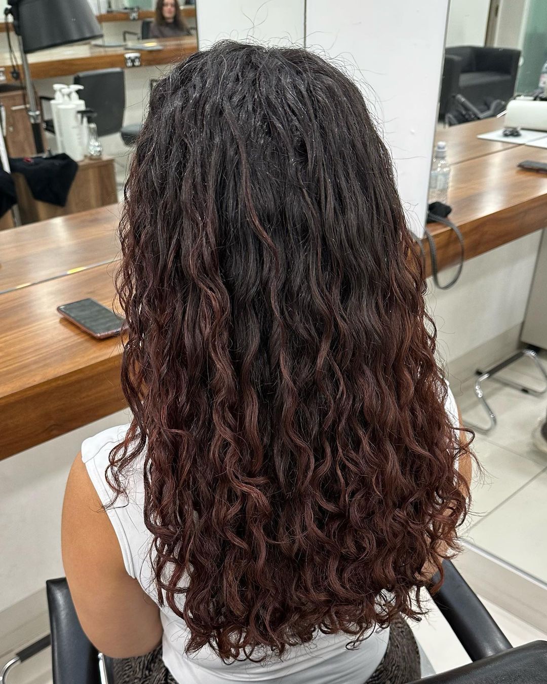 natural brown wavy hair with red highlights