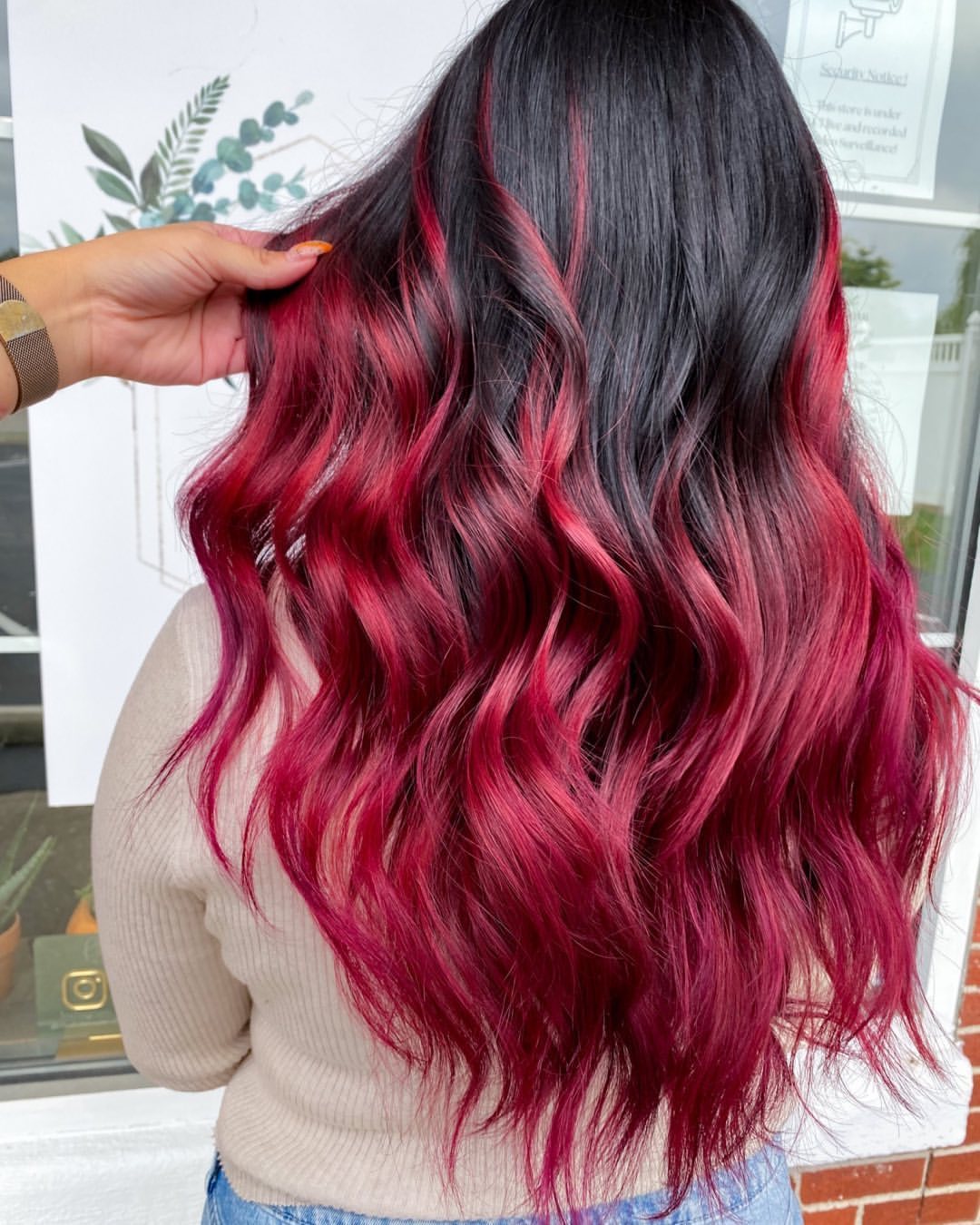 red ombre on layered wavy hair