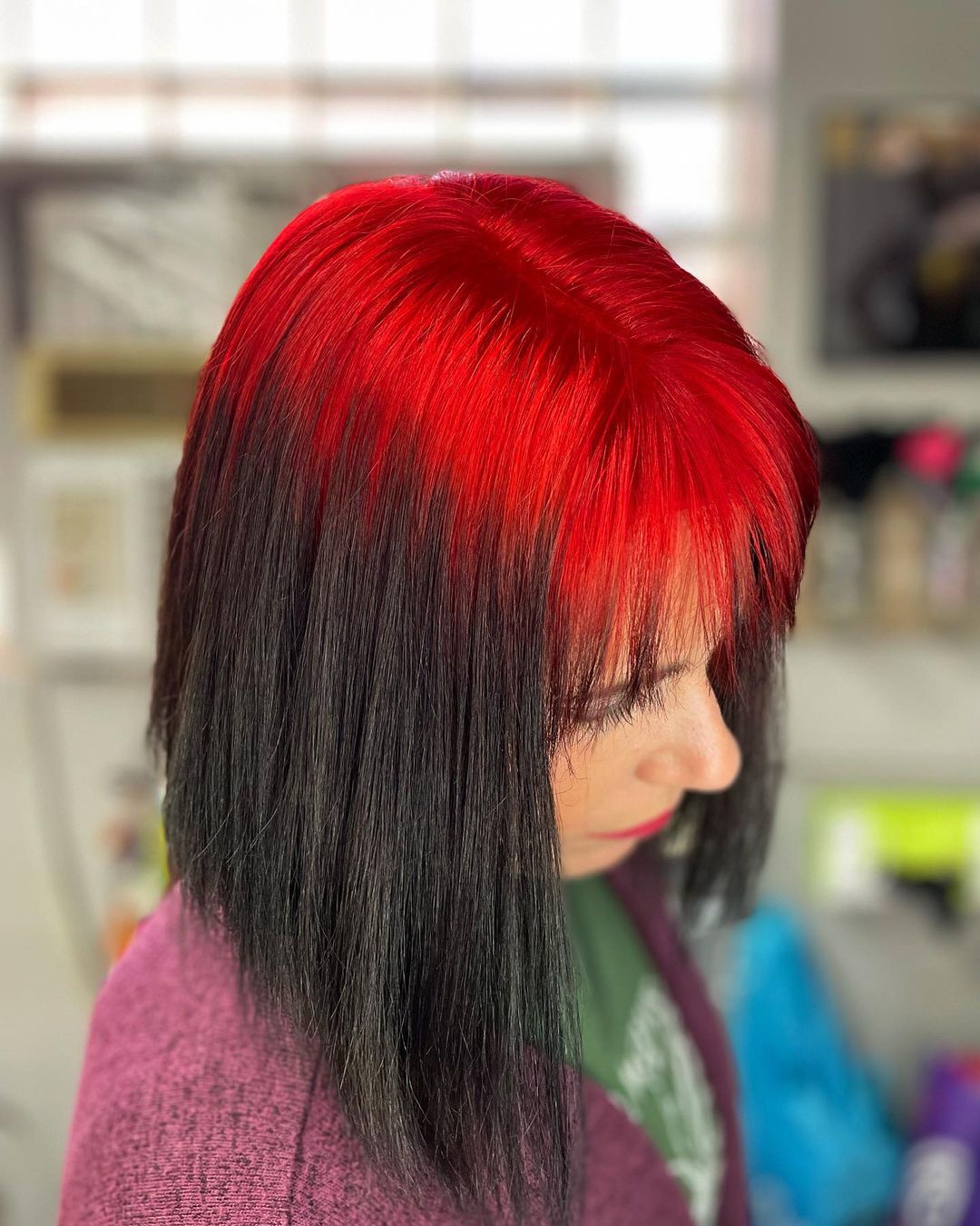 red roots and bangs on black blunt bob