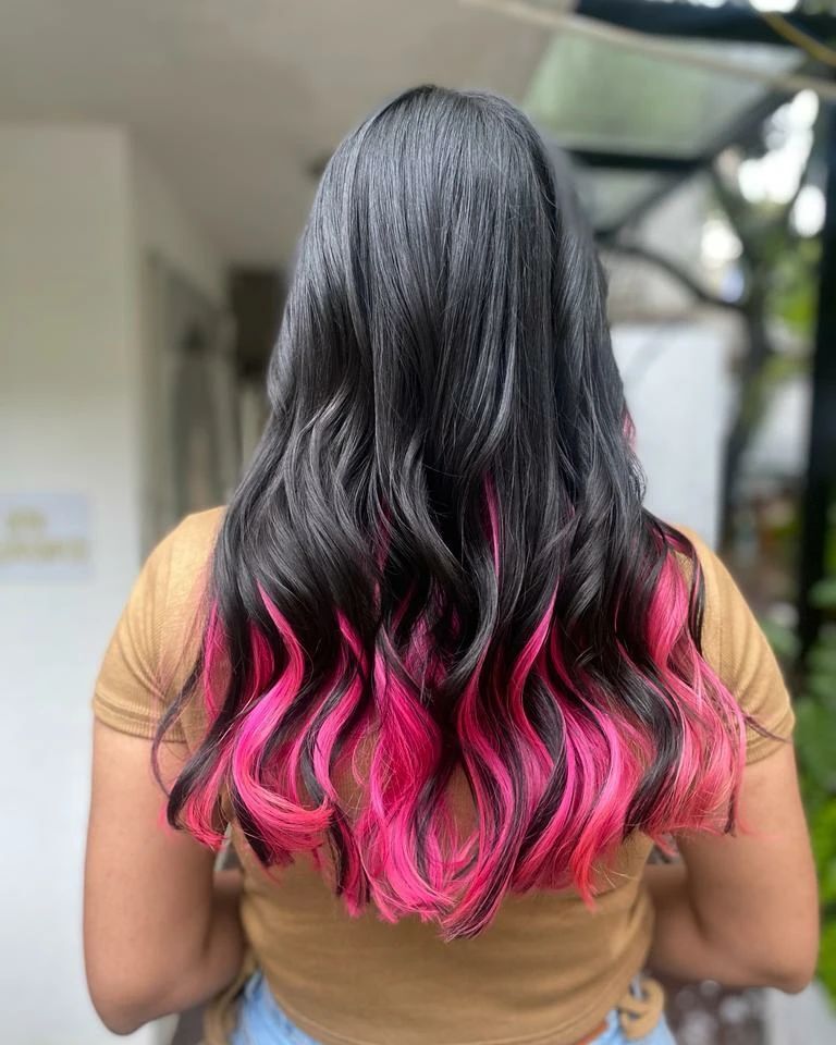 vivid pink peekaboo on black hair