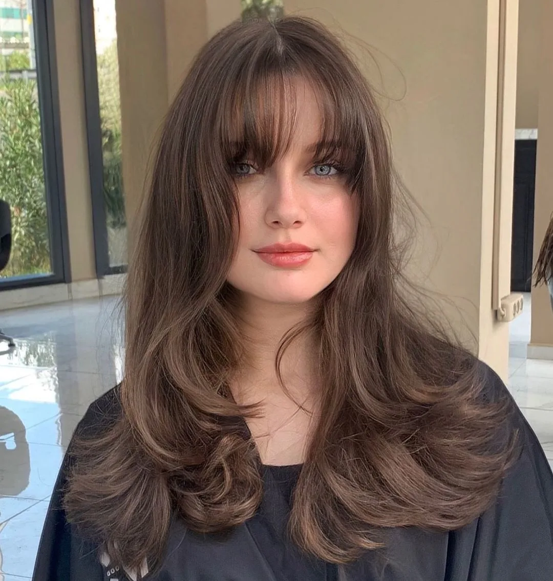 long brunette hair with wispy curtain fringe