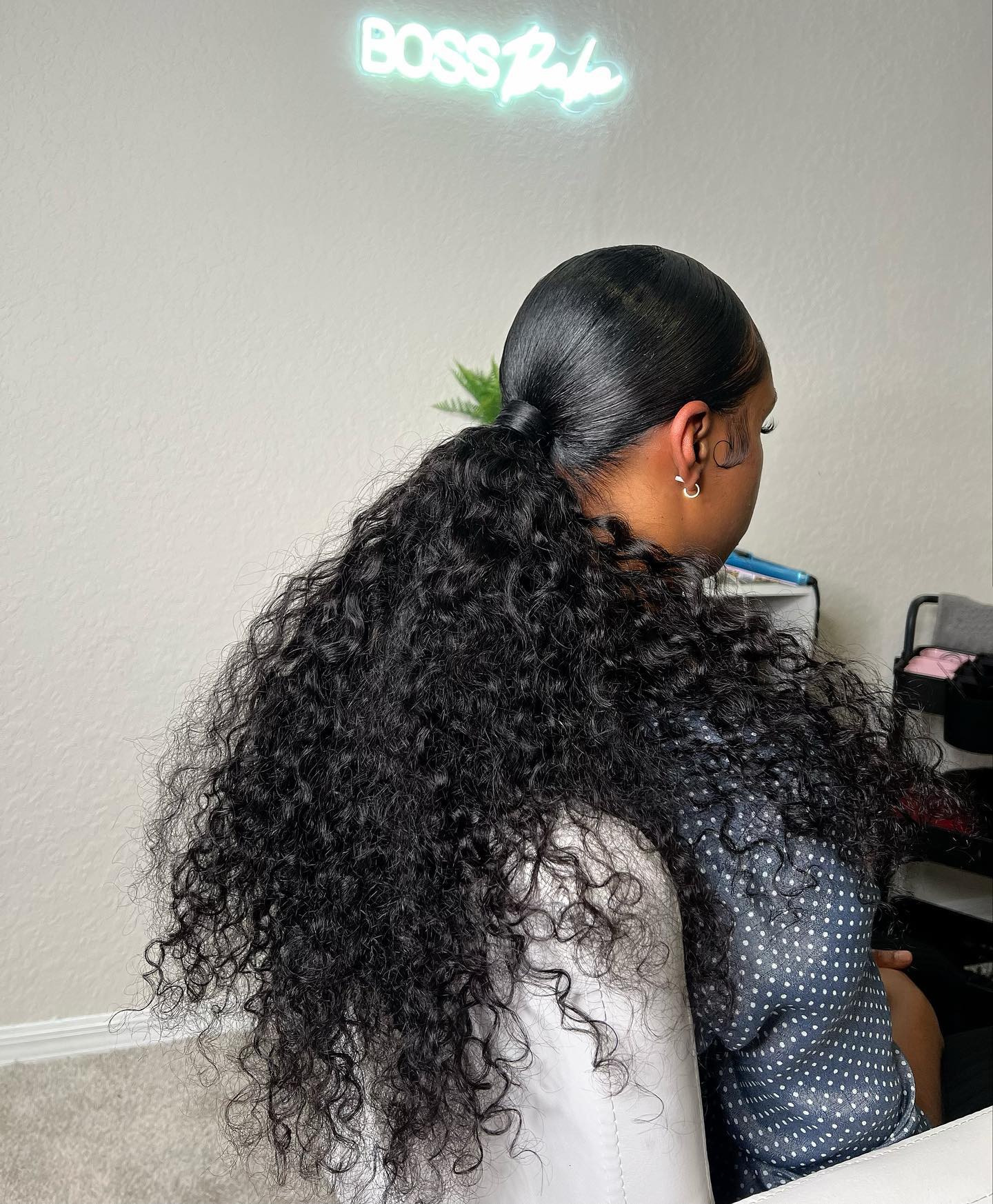 low ponytail hairstyle with weave