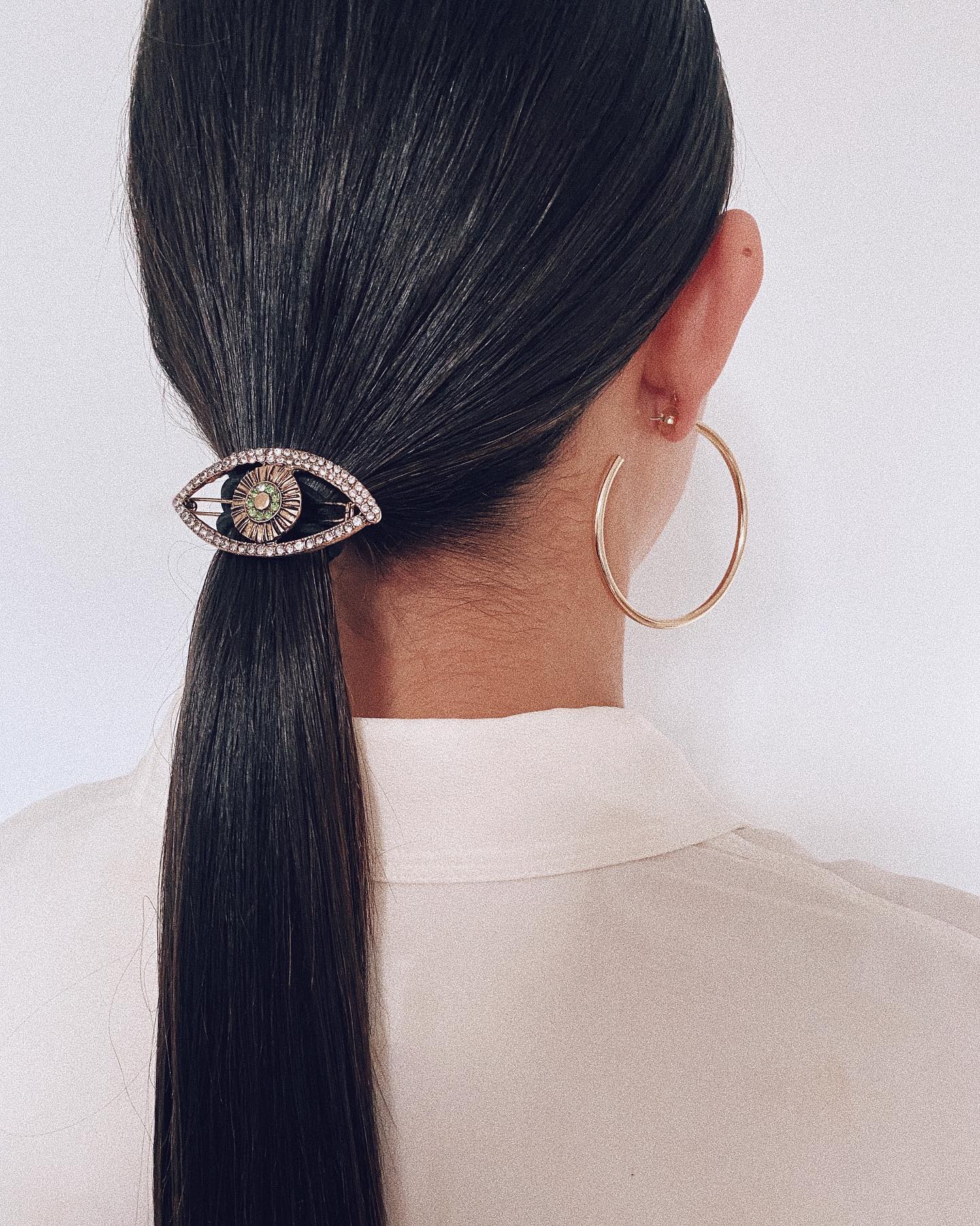 low ponytail with pin