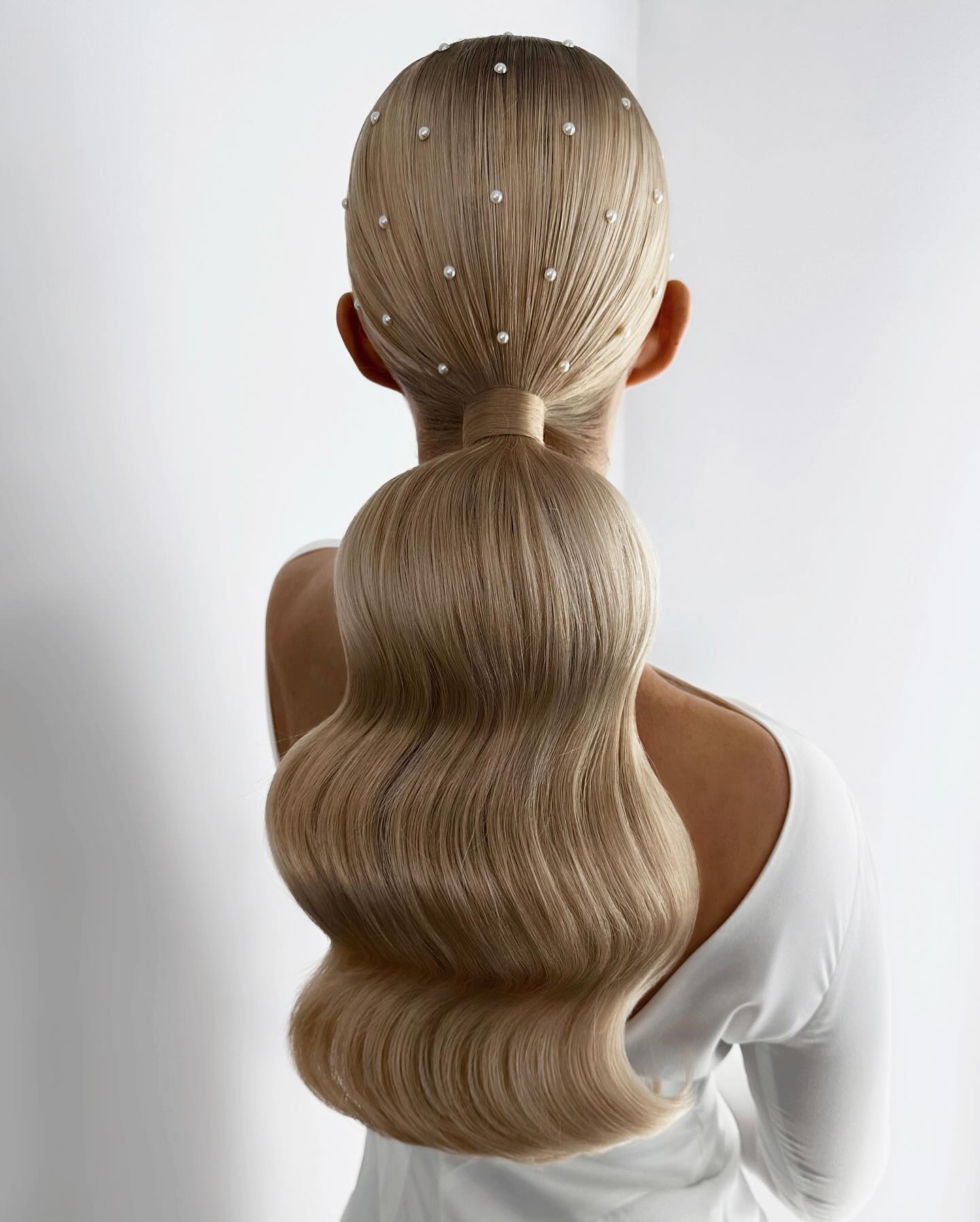 low ponytail with pearls