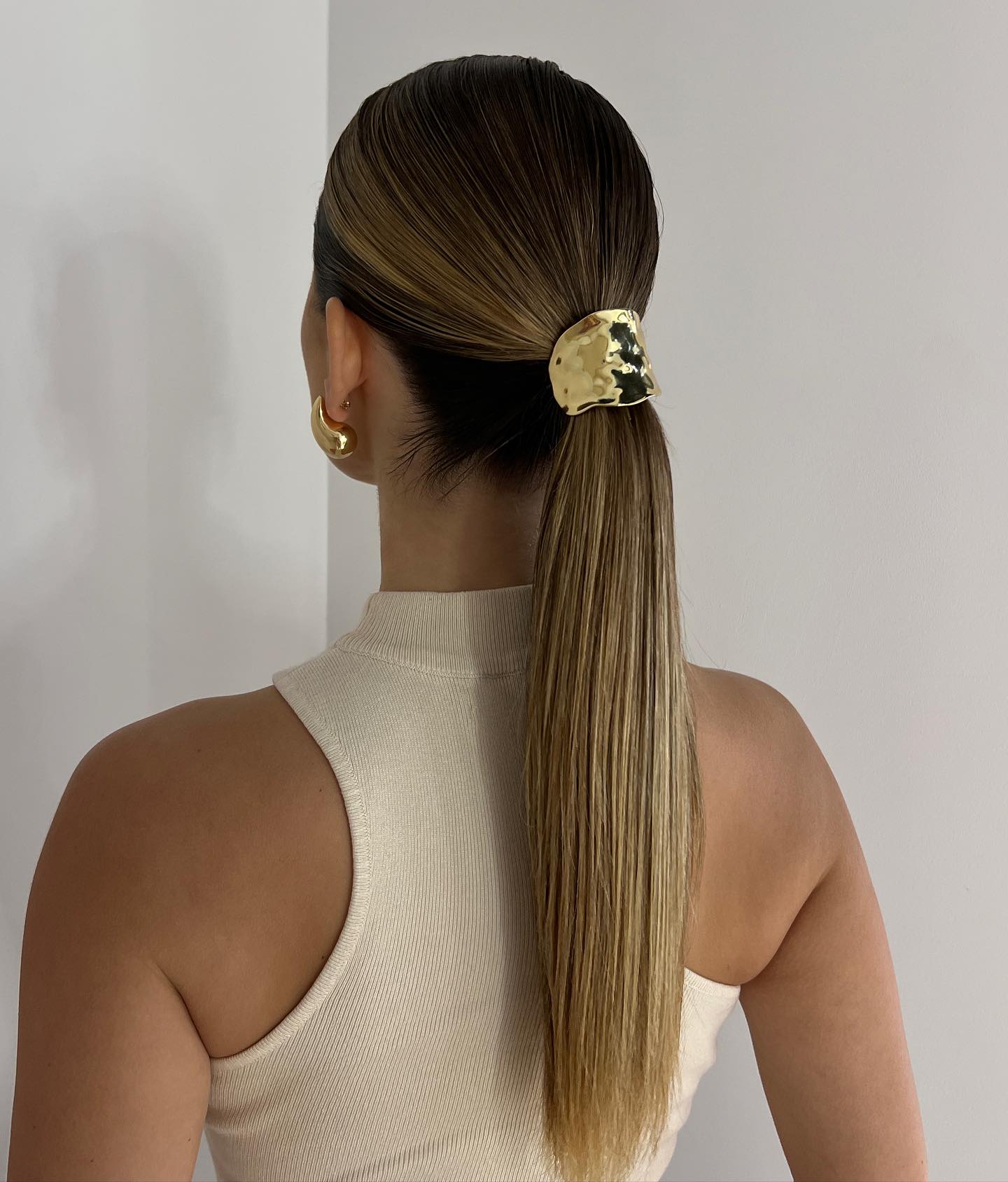 straight low ponytail with pin