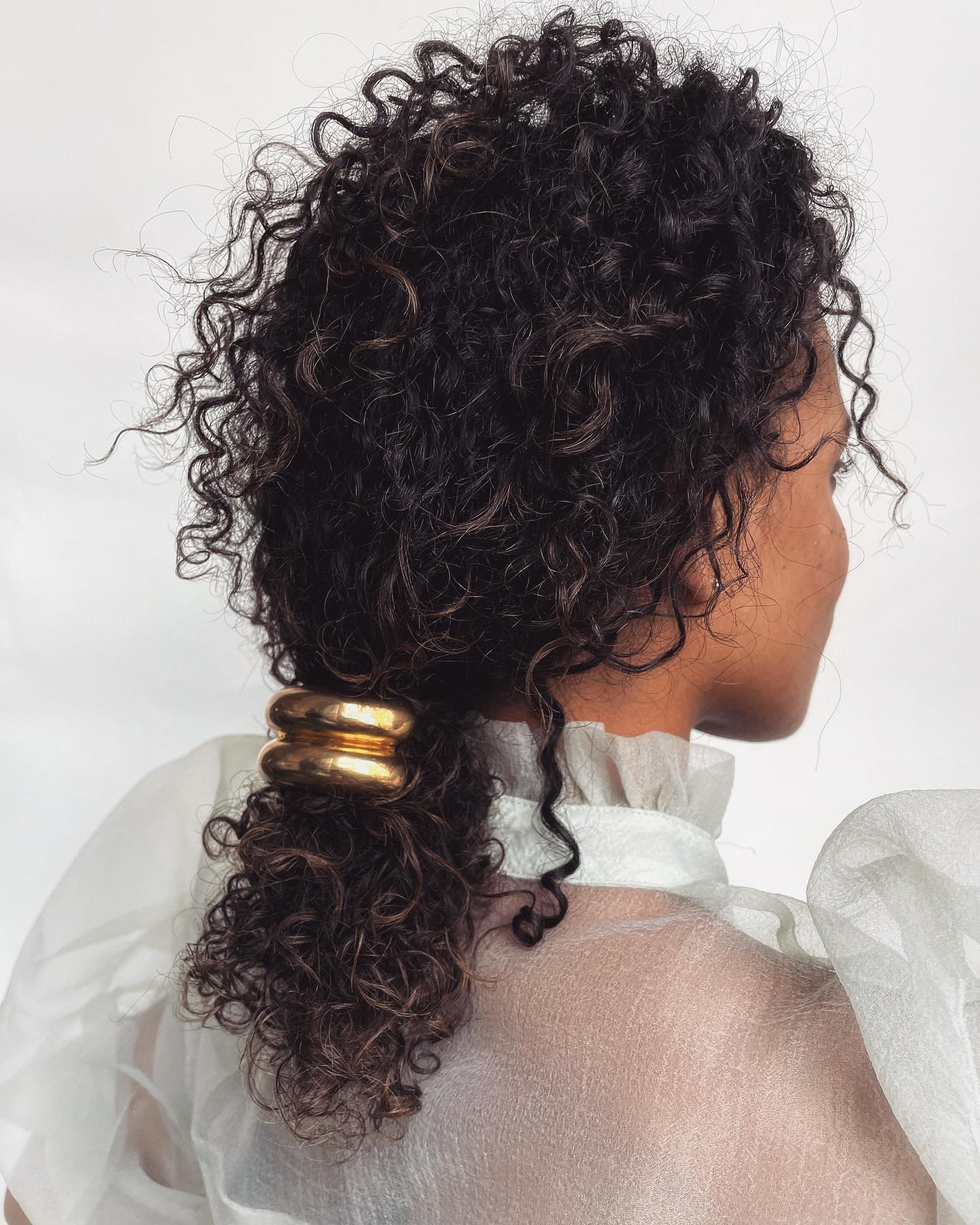 curly low pony with cuff