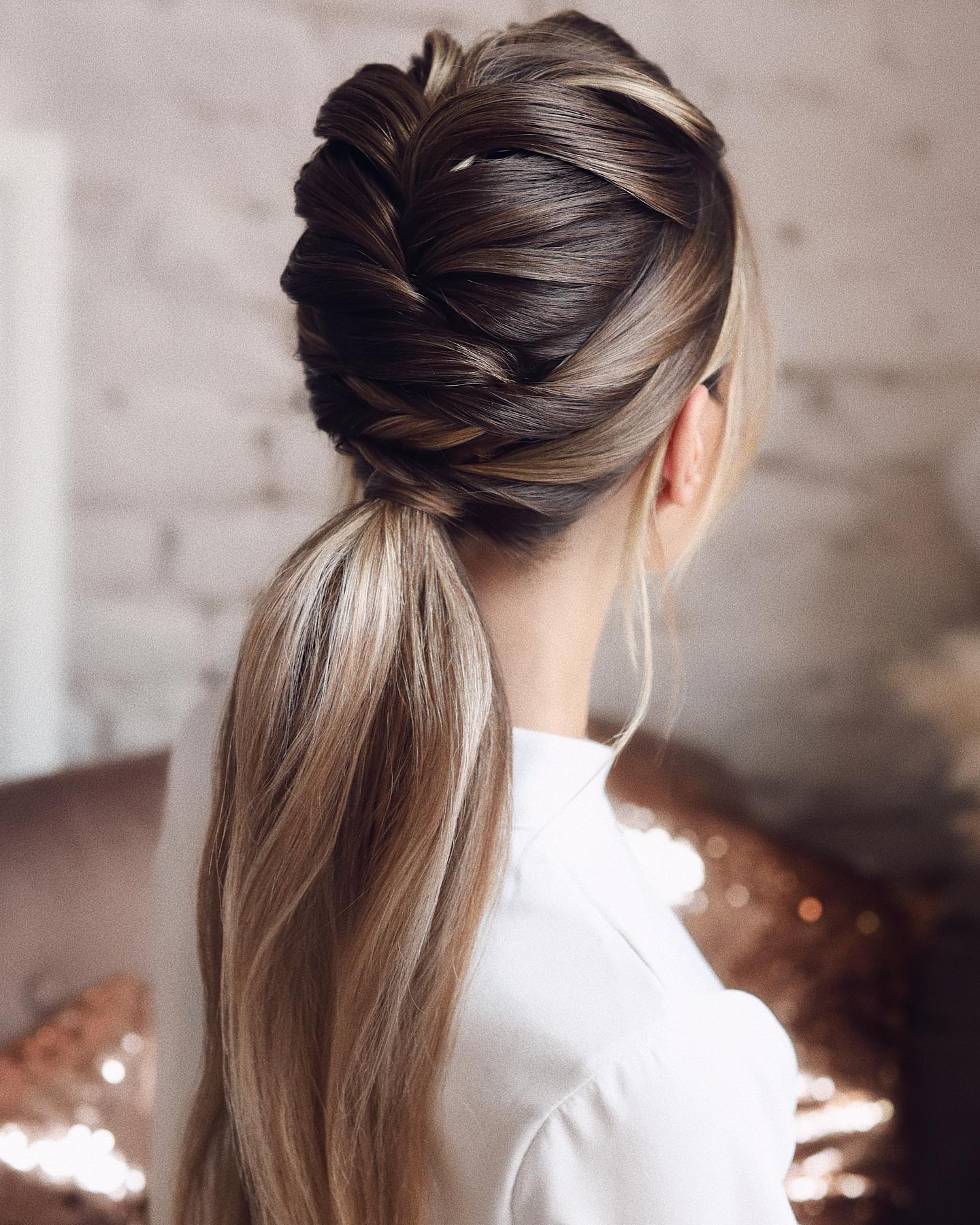 french braid into low ponytail