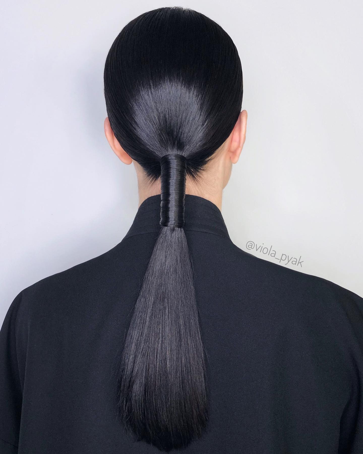 sleek low ponytail hairstyle