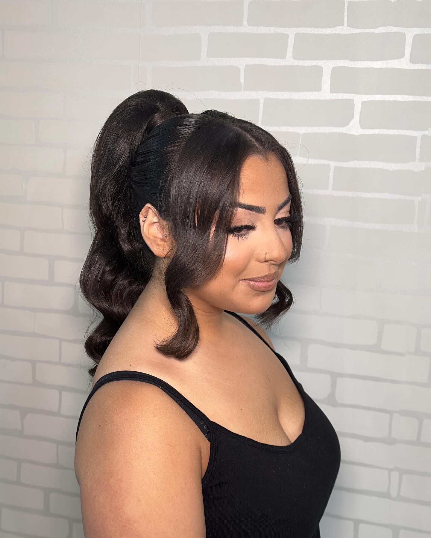 high prom ponytail hairstyle with front pieces