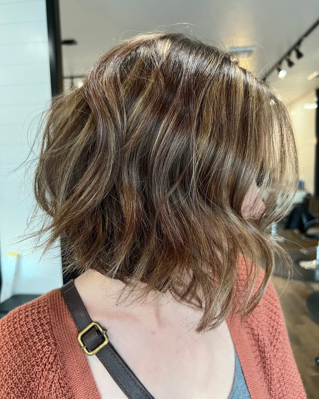 a woman with angled tousled wavy bob