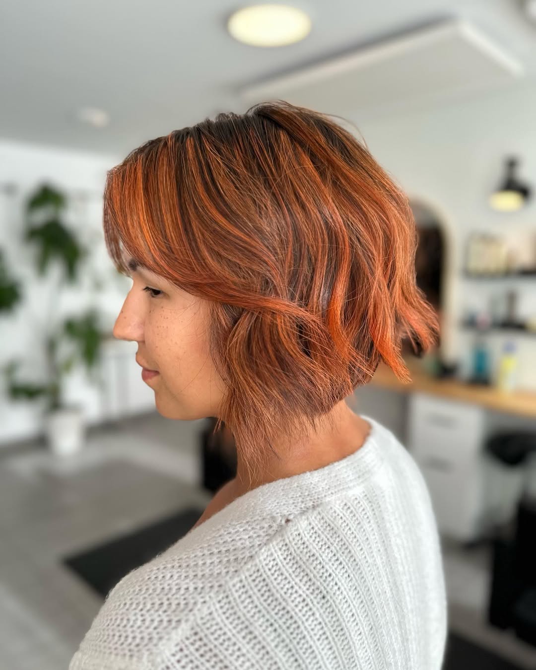 cabelo cortado em cobre ao nível do queixo