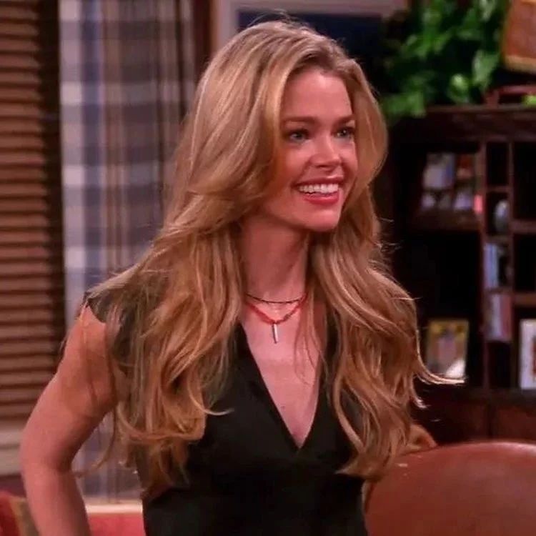 denise richards with long 90s layered hair