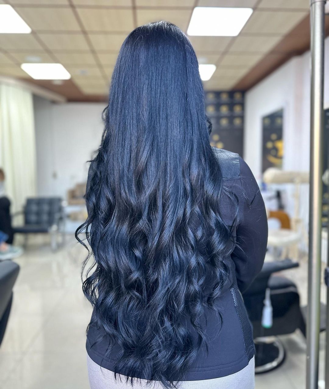 long blue black curled hair