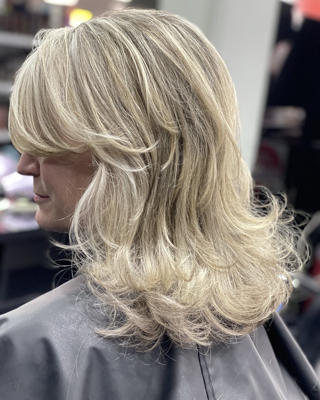 mousy blonde medium layered cut