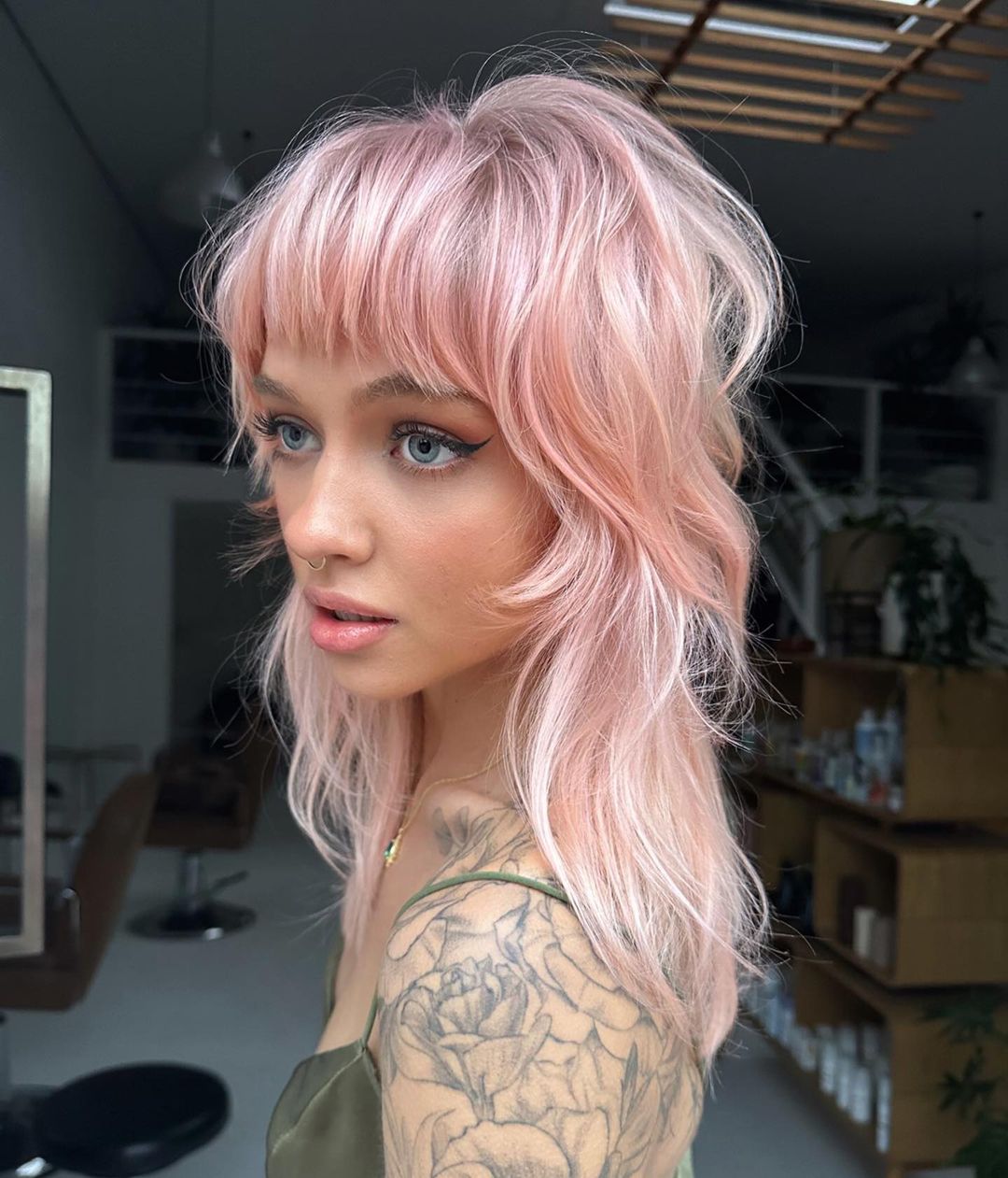 pastel pink blonde shag on wavy hair