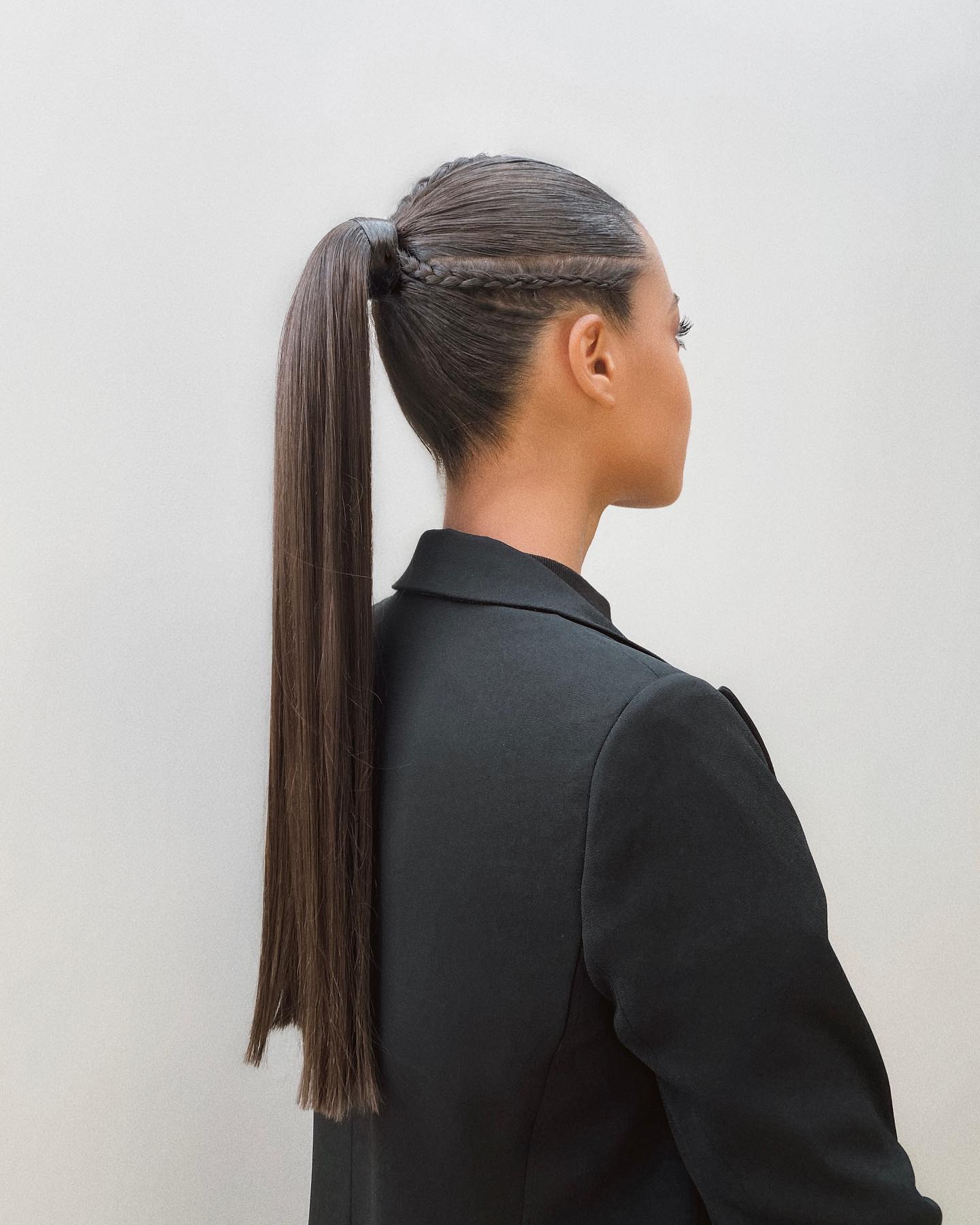 high ponytail with side braids