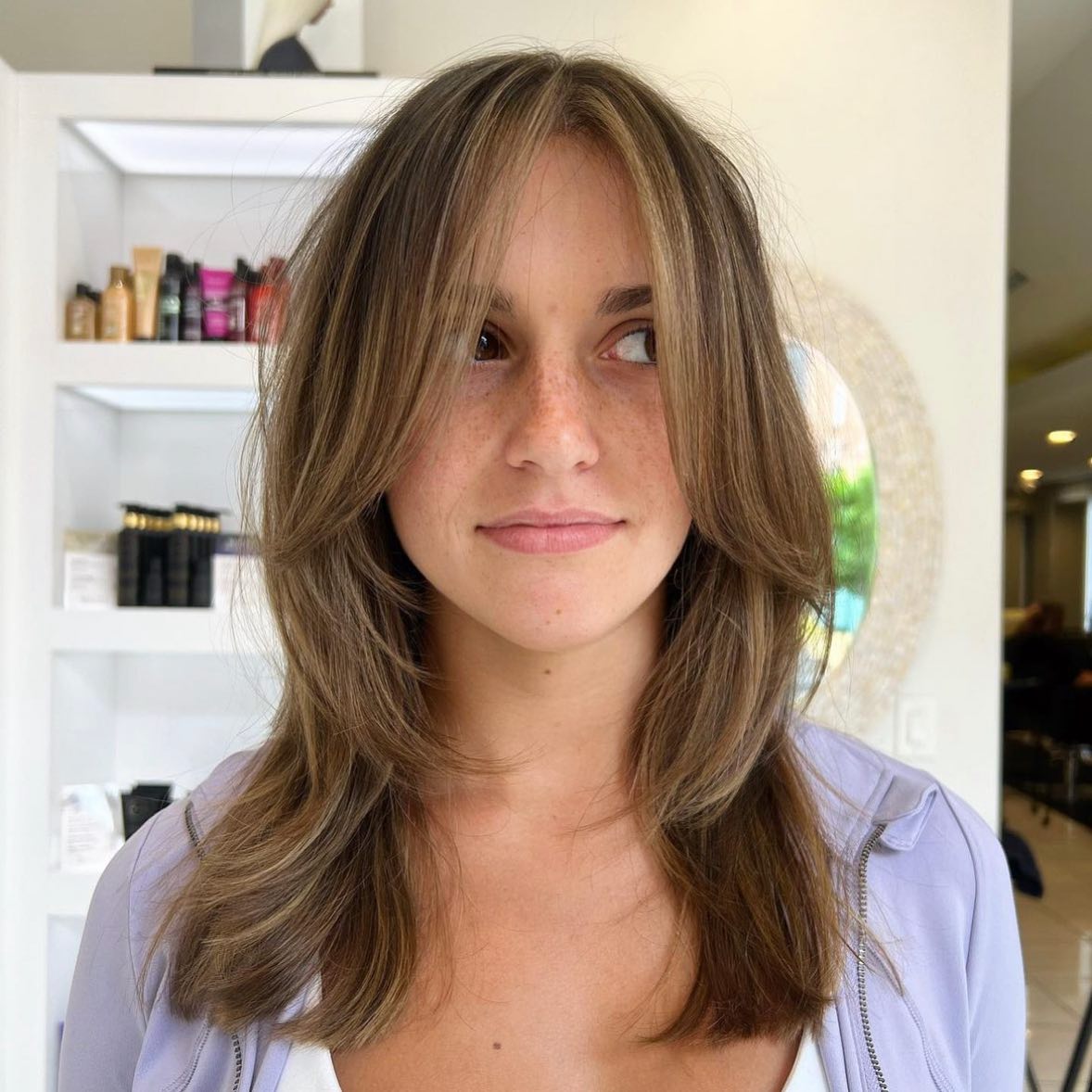 shoulder-length hair with curtain bangs