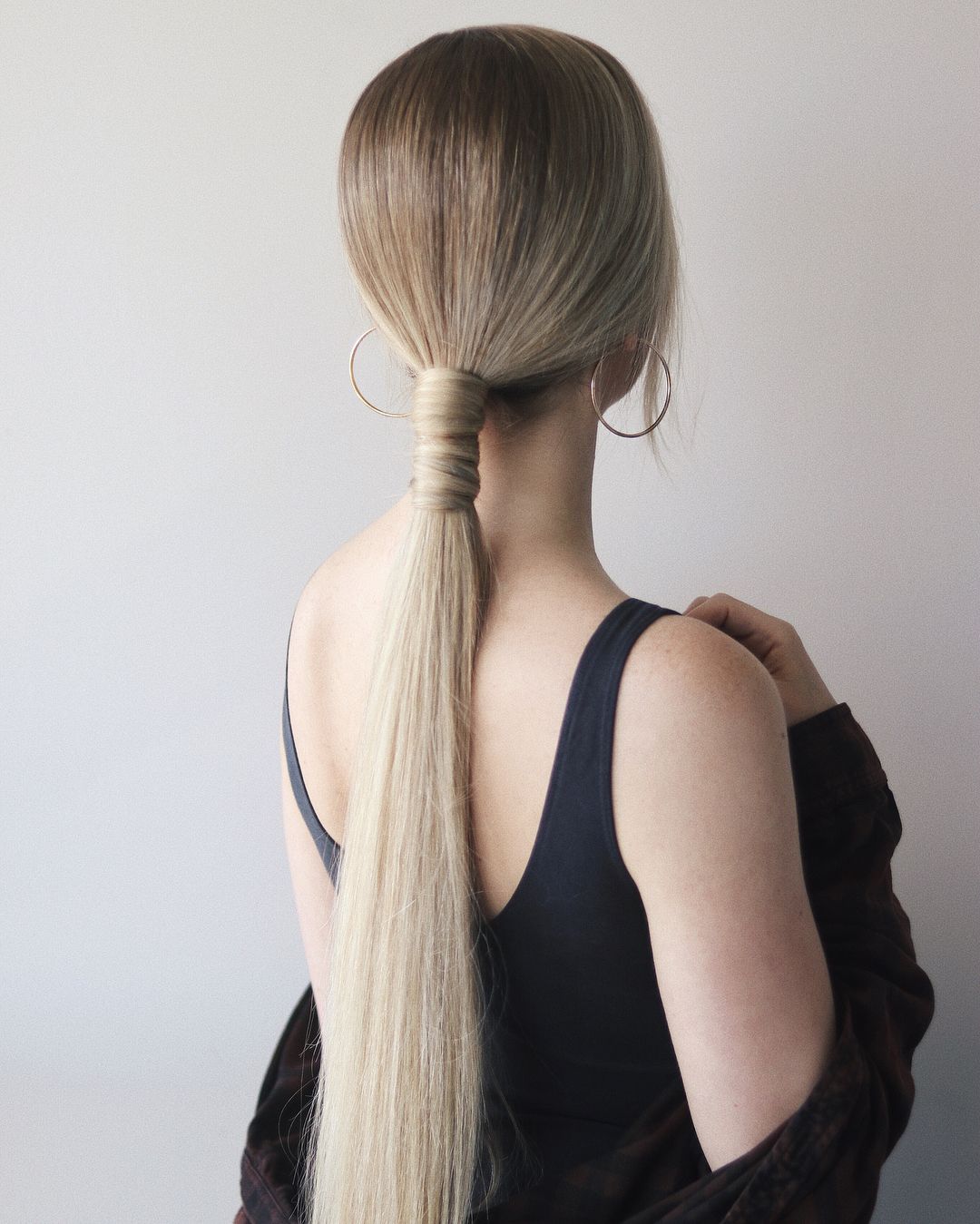 low straight ponytail hairstyle