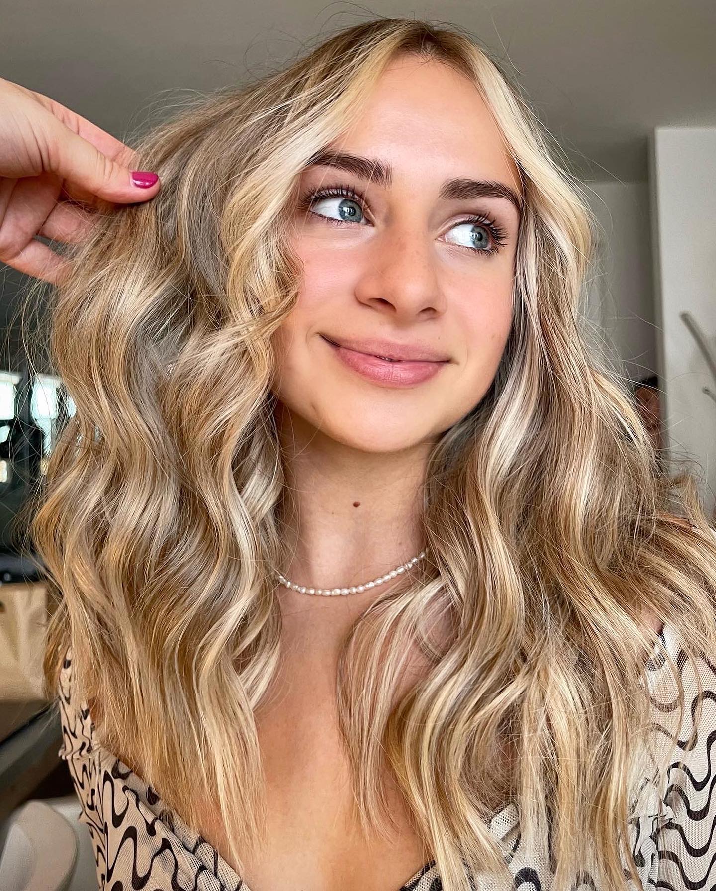 dimensional blonde with face-framing highlights