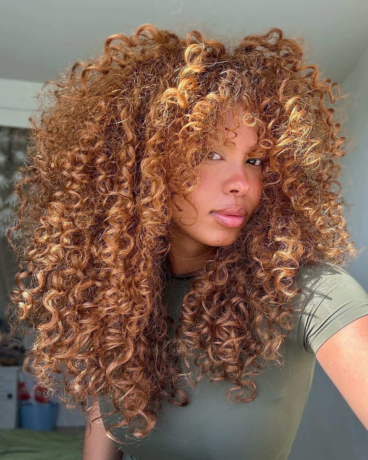 voluminous long layered curly hair