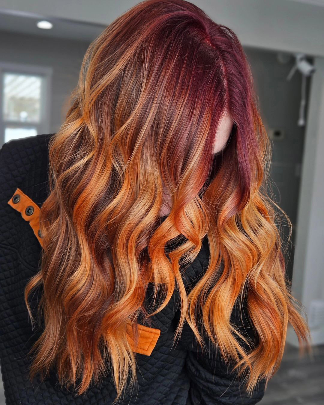 mahogany light orange layered wavy hair
