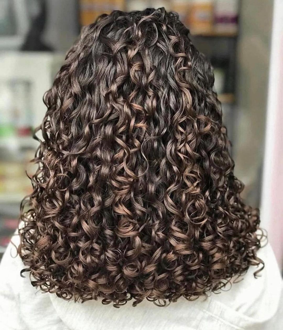 layered curly rezo cut